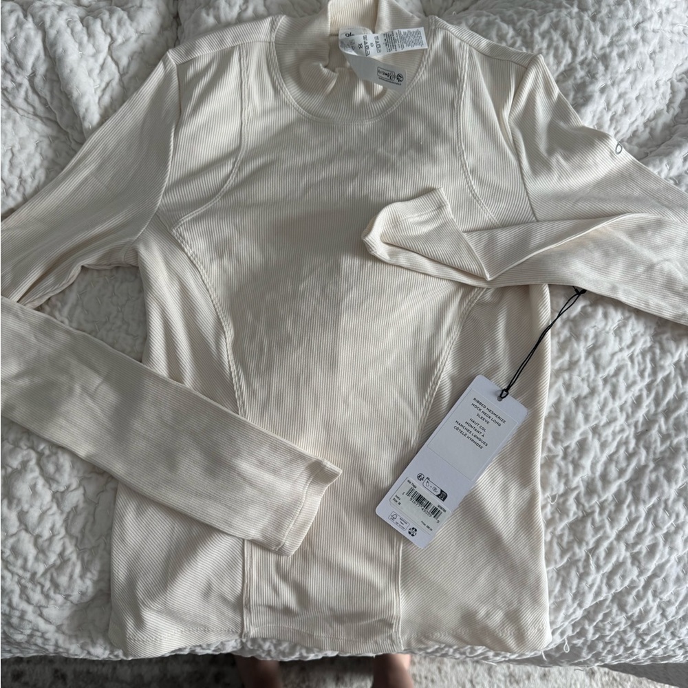 Alo Yoga Ribbed Mesmerize Mock Neck Long Sleeve in Ivory